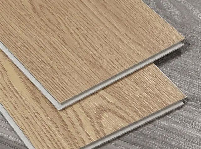 Wood-grain flooring sample planks showing their edge profiles